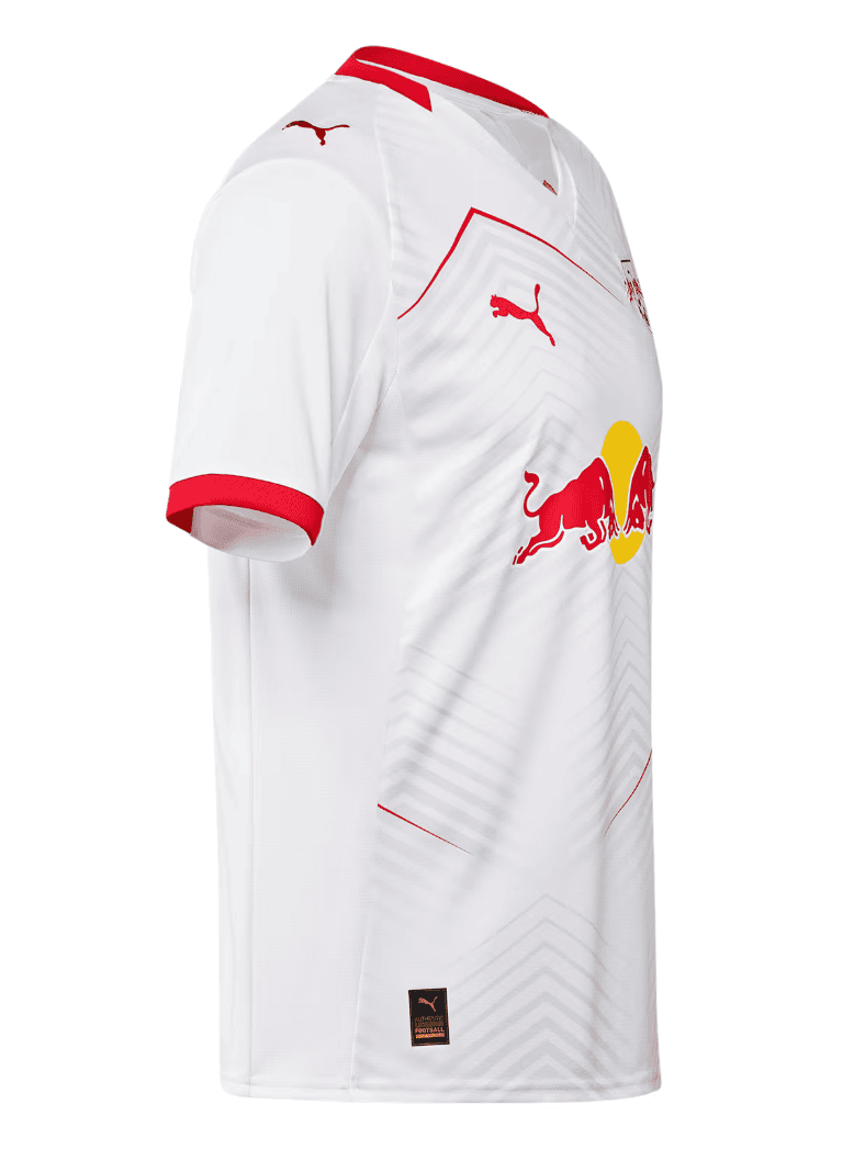 Screenshot_2025-06-19_045135 | AE JERSEY White football jersey with red trim and Red Bull sponsor logo on the front; features Puma logos on the chest and sleeve, and a subtle geometric pattern.