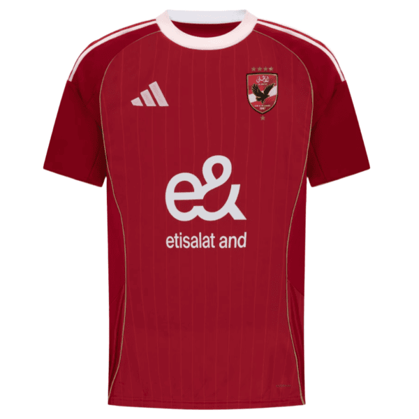Front view of a red football jersey with white collar, vertical stripes, and a team crest on the left chest