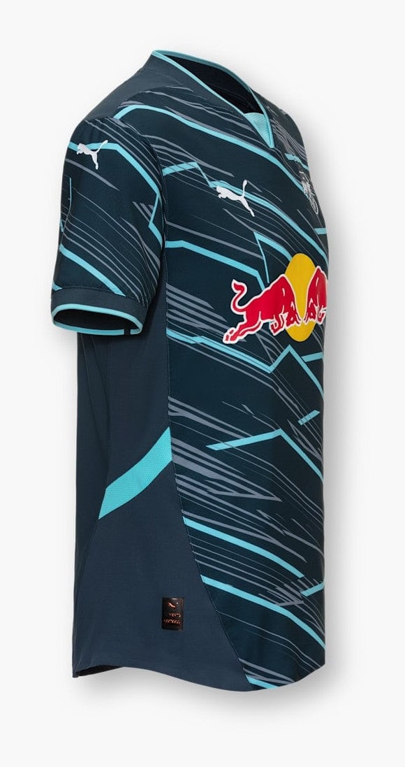 UiCZAHL9fzrhd4T | AE JERSEY Navy blue Red Bull football jersey with teal zigzag stripes and Puma logos, shown from the side.