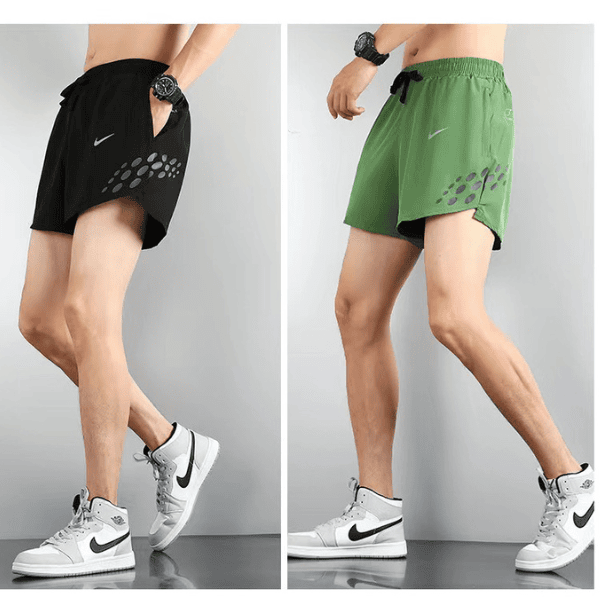 Side-by-side photos of a male model wearing Nike running shorts: left in black with pocket and dotted hem pattern, right in green with same design, paired with white sneakers.