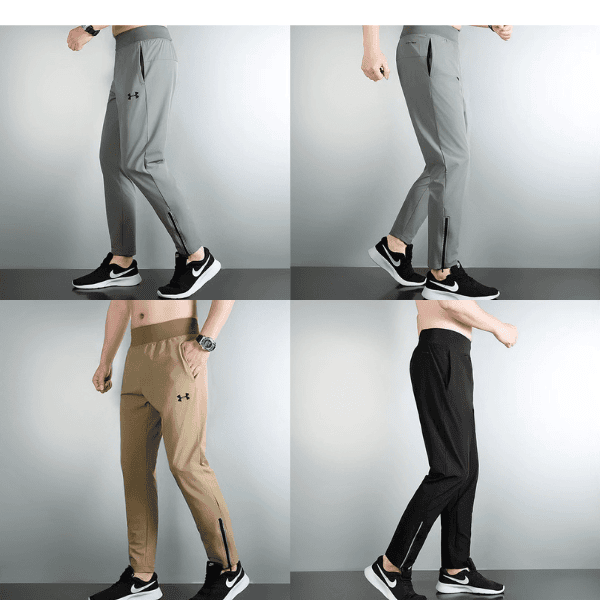 Men's gray jogger pants with ankle zipper, shown in left-profile view on a light background with sneakers.