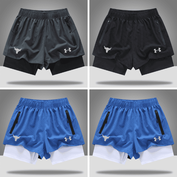 Grid of four athletic shorts (two dark gray/black, two royal blue) with zip pockets and white logos; each pair shows a layered underlayer.