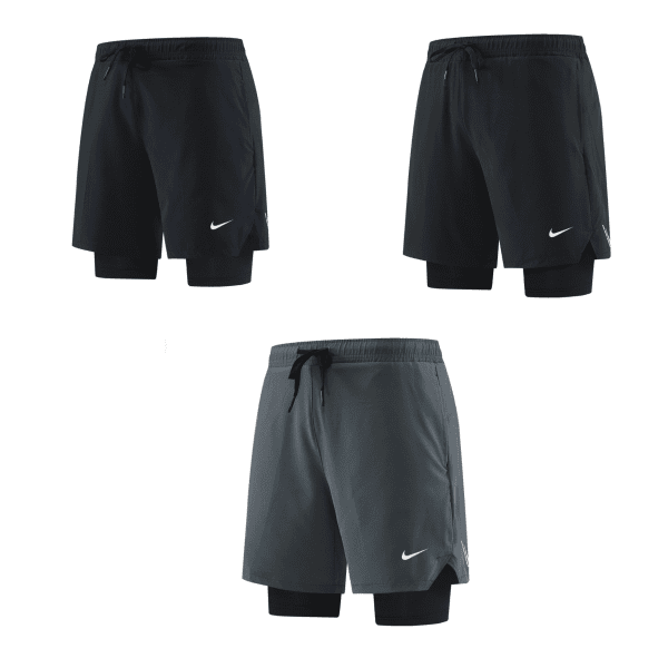 Two Nike athletic shorts shown side by side: navy left and black right, with drawstrings and inner compression shorts visible beneath.