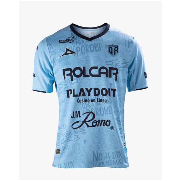 Light blue sports jersey with a dark V-neck and multiple sponsor logos, including ROLCAR, PLAYDOIT, and J.M. Romo, on a white background.