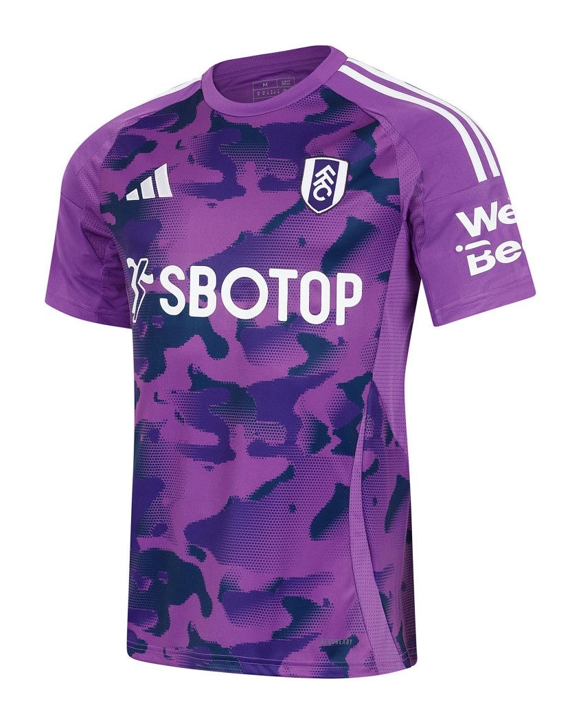 VLTsDMQfI1tnF4K | AE JERSEY Purple camouflage soccer jersey with SBOTOP sponsor, club crest on chest, and white shoulder stripes (short sleeves). In-use as a football kit.