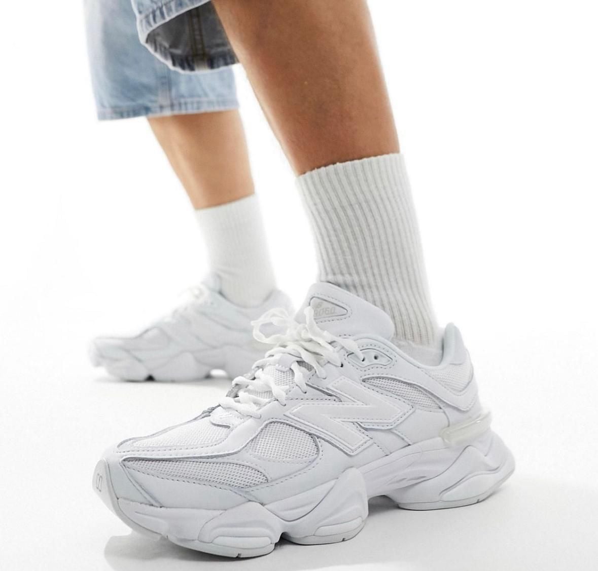 WhatsApp_Image_2024-10-25_at_12.39.10 | AE JERSEY White chunky sneakers with laces, worn with white crew socks and denim shorts on a light background.