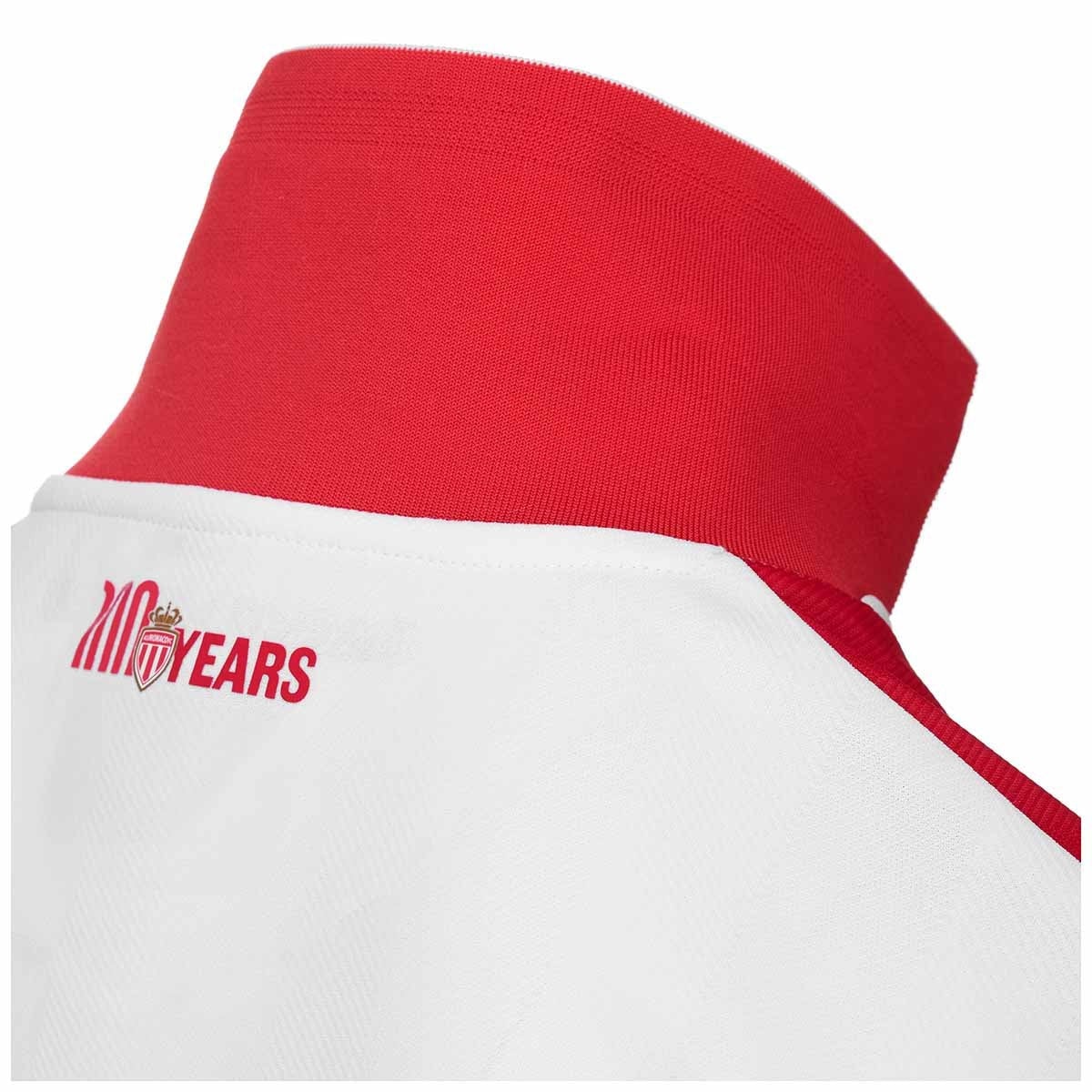 XpruEtjUIZaclAi | AE JERSEY Close-up of a white cap with a red crown, featuring a red '100 YEARS' logo on the side.