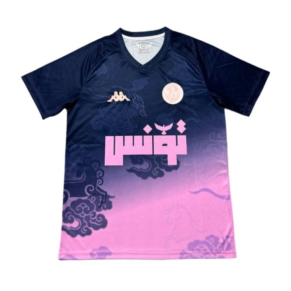 Dark navy to pink gradient sports jersey with cloud-like patterns, left chest shows a white Kappa logo, right chest a circular pink emblem, and bold pink block letters near the lower front.
