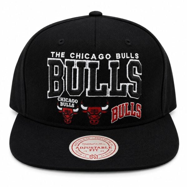 Black Chicago Bulls hat with large white BULLS embroidery and two red Bulls logos on the front panel.