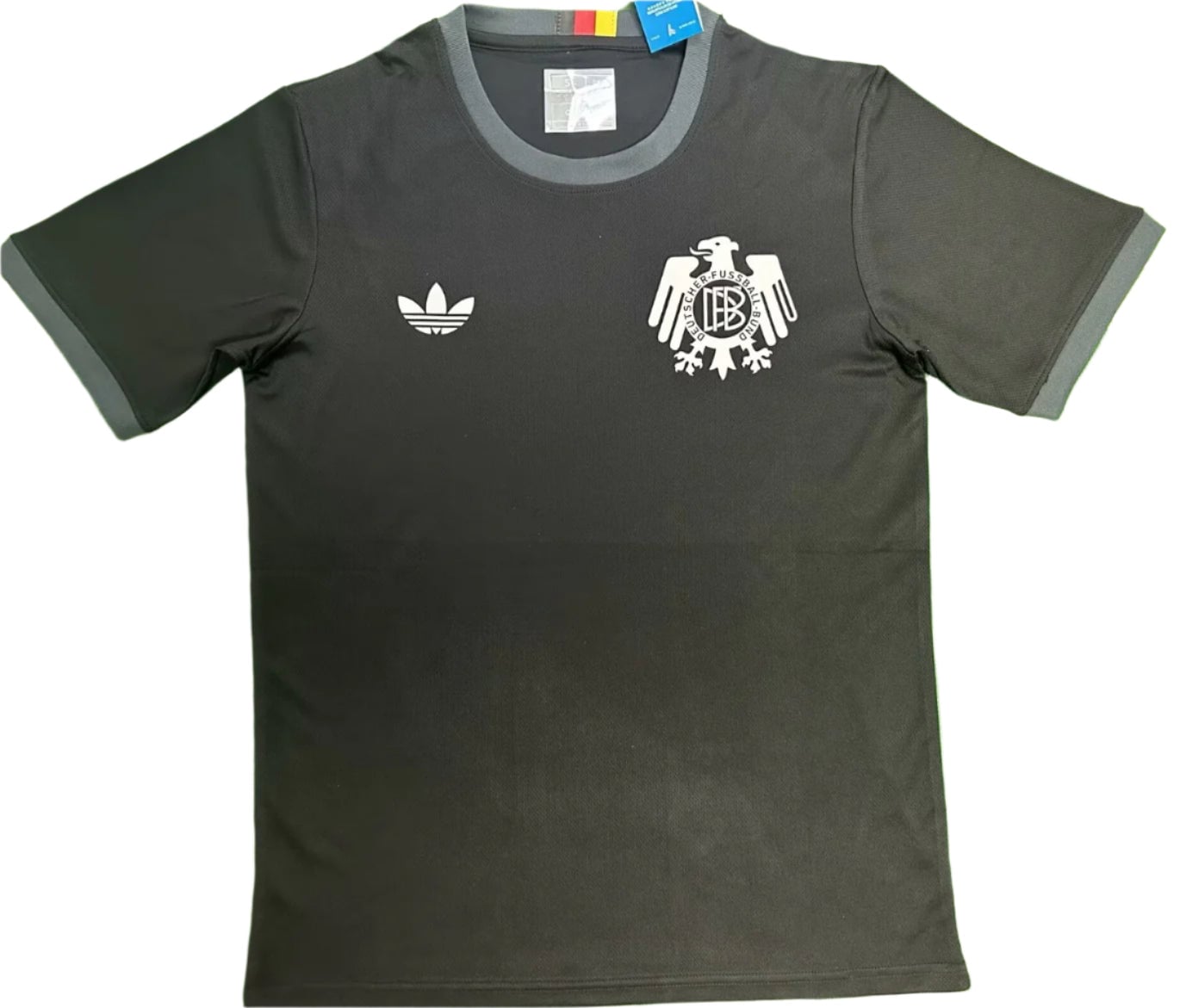 b87538d3-02a3-4ecb-bc19-b025de49e5dd | AE JERSEY Black short-sleeve sports T-shirt with Adidas logo on the left chest and a white German football federation crest on the right chest.