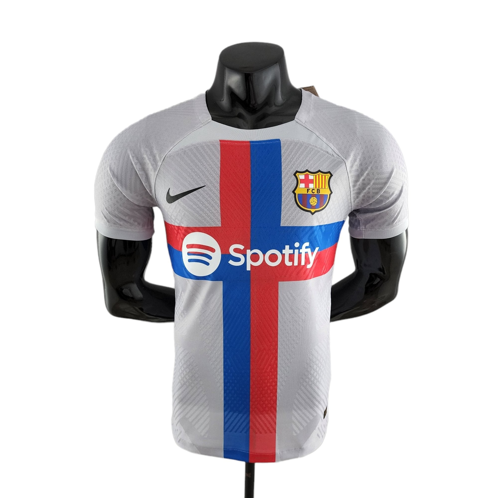 barcelona-third-player-version-jersey-202223-388831 | AE JERSEY Mannequin wearing a Barcelona football jersey with Spotify sponsor and blue-red vertical stripe on the chest.
