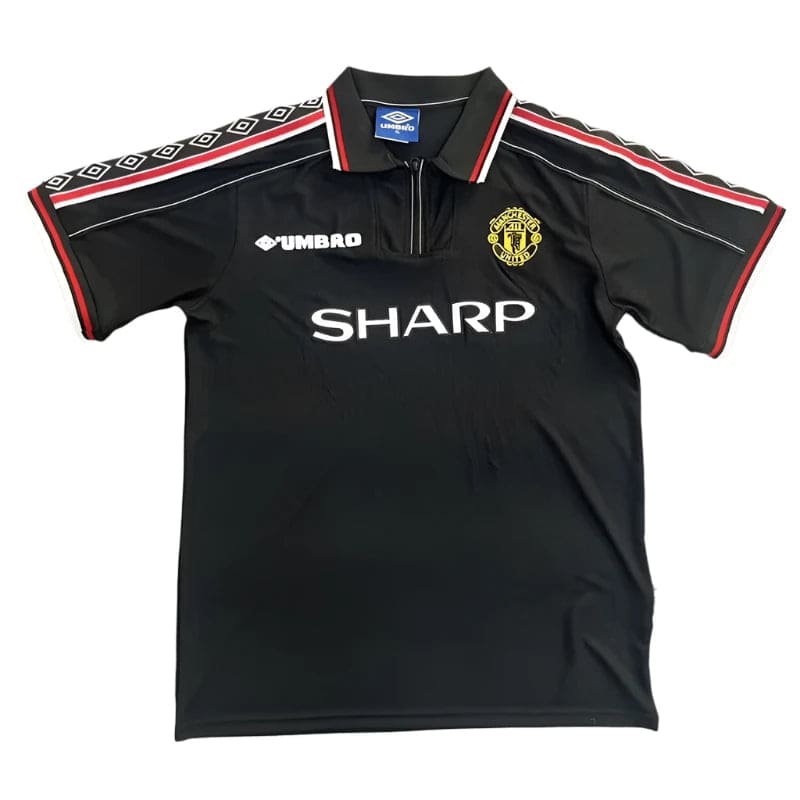 c509ddb25dce4605 | AE JERSEY Black Manchester United football jersey with SHARP sponsor, Umbro logo, and club crest on the chest; red and white piping on sleeves.