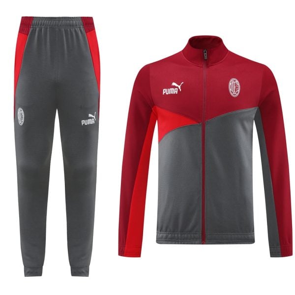 c8e5e11f | AE JERSEY Milan football tracksuit: gray pants with red side panels and Puma logo, plus a red-gray zip jacket with club crest on the chest.