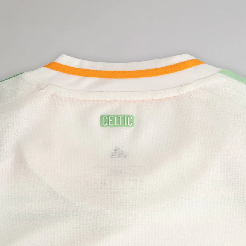 celtic-men-s-2025-26-third-shirt-1180888102 | AE JERSEY Back of a white Celtic football jersey with an orange trim on the collar and a green CELTIC label.
