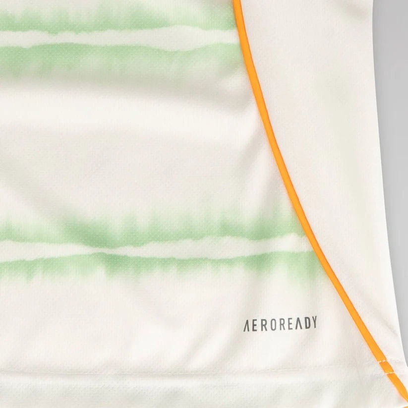 celtic-men-s-2025-26-third-shirt-1180888104 | AE JERSEY Close-up of white athletic fabric with light green horizontal stripes and an orange seam, showing the AEROREADY branding.