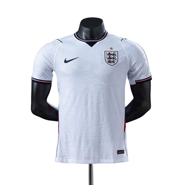 White England national team football jersey with crest on the chest and Nike logo, displayed on a mannequin press.