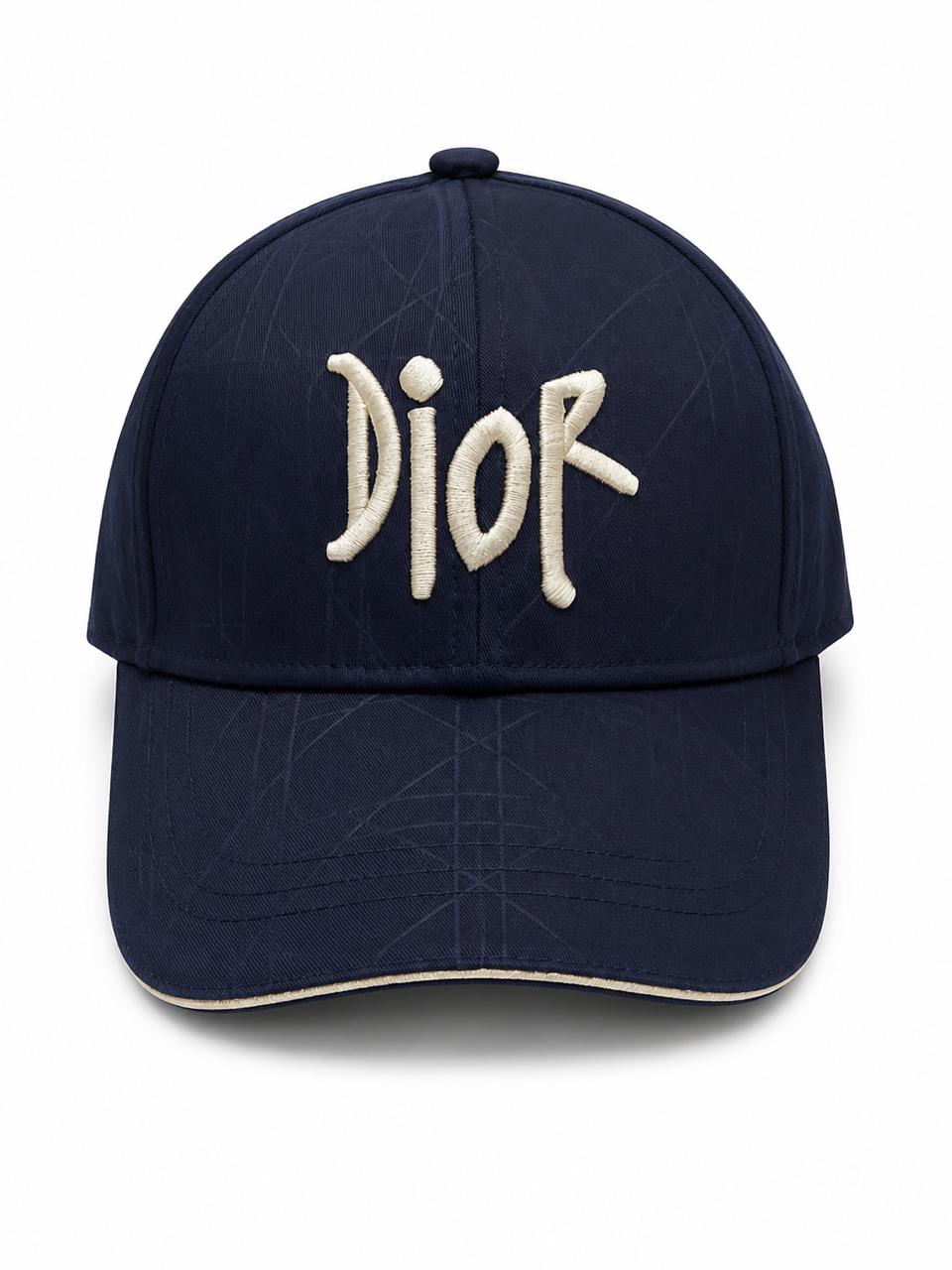 d6ed73d3-f805-4fa3-a529-e6327547df6b | AE JERSEY Navy baseball cap with white Dior embroidery on the front.