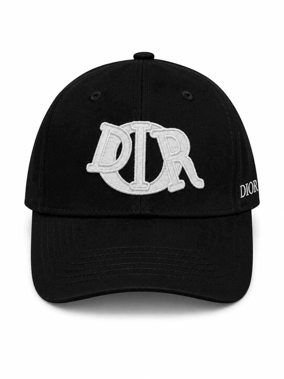 d80d7607-2199-4586-83f6-615747e04b38 | AE JERSEY Black baseball cap with a large white embroidered logo on the front and 'DIOR' lettering on the side.
