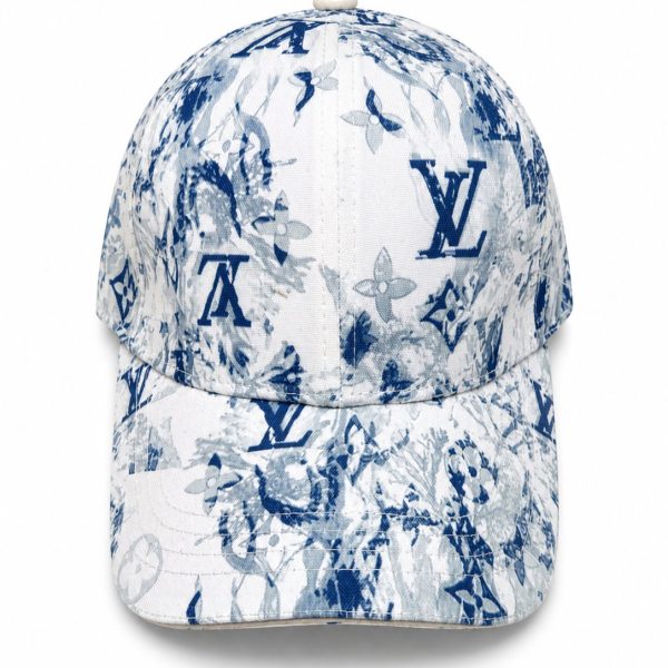 e4b446e5-2d3c-4214-879c-e7ad54dc0741 | AE JERSEY Blue-and-white floral Louis Vuitton cap with LV monogram pattern on a white background, front view.