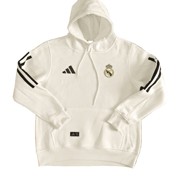 White Real Madrid hoodie with hood, Real Madrid crest on chest, Adidas logo on the right, black stripe accents on sleeves, front pocket, drawstrings visible.