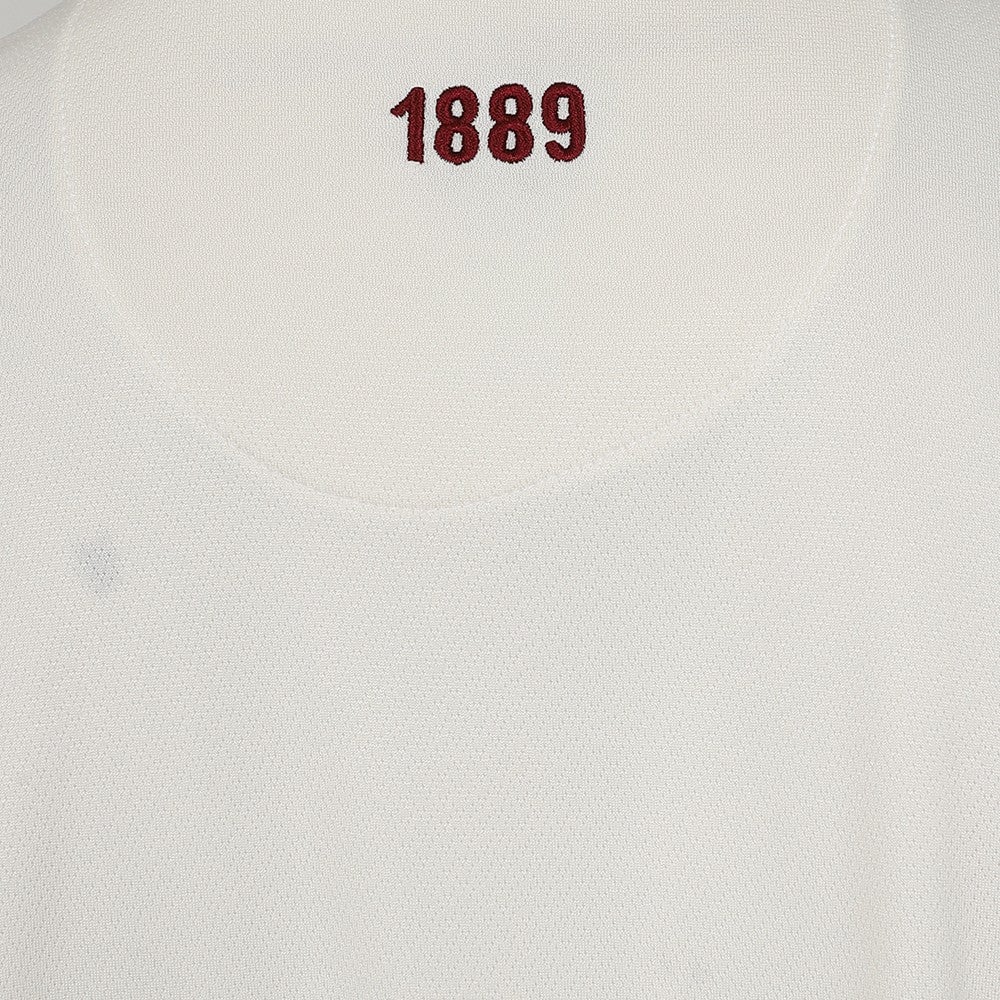 fTGOQepFB2110ob | AE JERSEY Beige fabric with red embroidered number '1889' near the collar area.