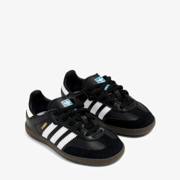 Pair of black Adidas Samba sneakers with white stripes and brown soles, shown side-by-side.