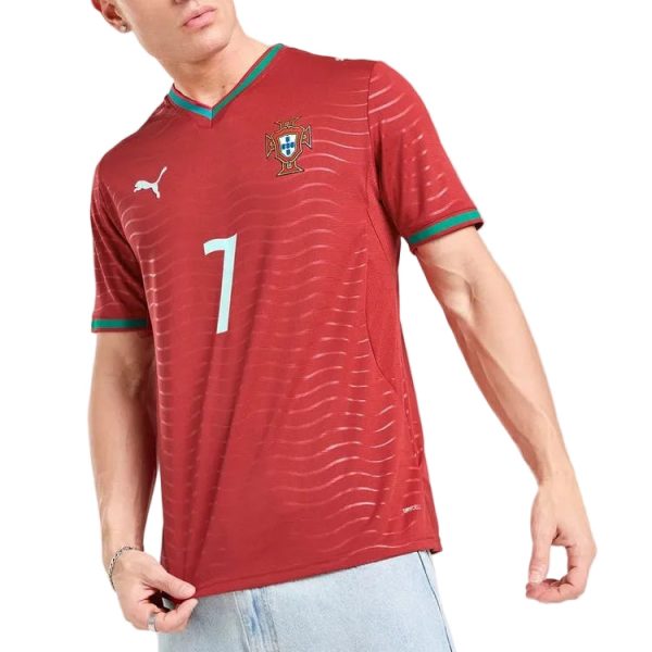 Portugal national team red soccer jersey with number 7, crest on chest and Puma logo, front view