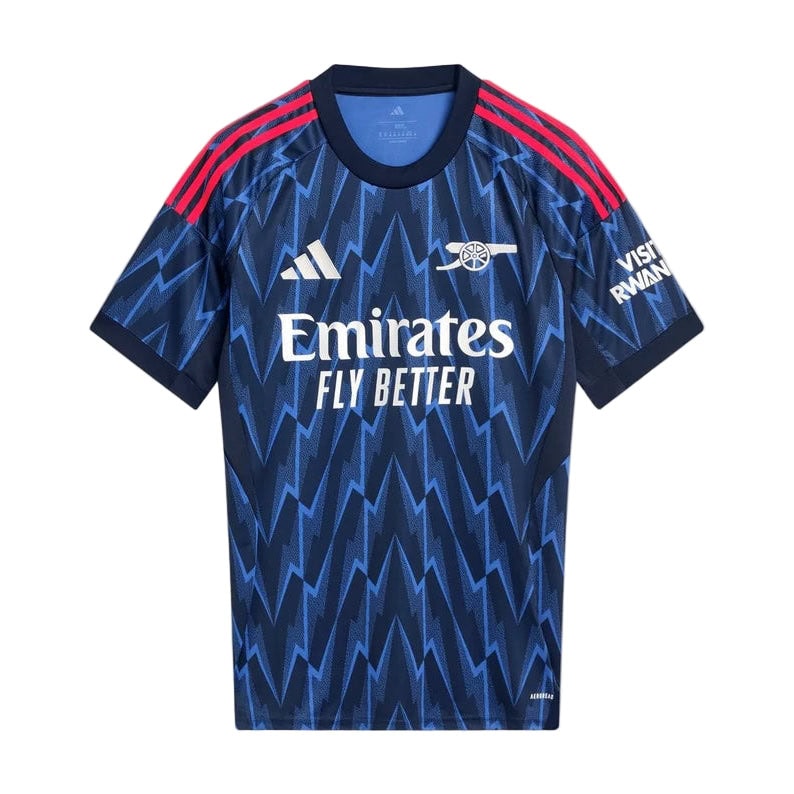 mji9511_f1 | AE JERSEY Blue zigzag-pattern sports jersey with Emirates Fly Better sponsor text on chest and dark navy trim on sleeves and collar.