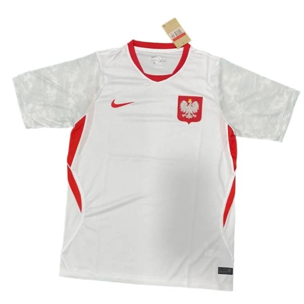 White Poland national football jersey with red collar, red side panels, Nike swoosh, and white eagle crest on the chest.