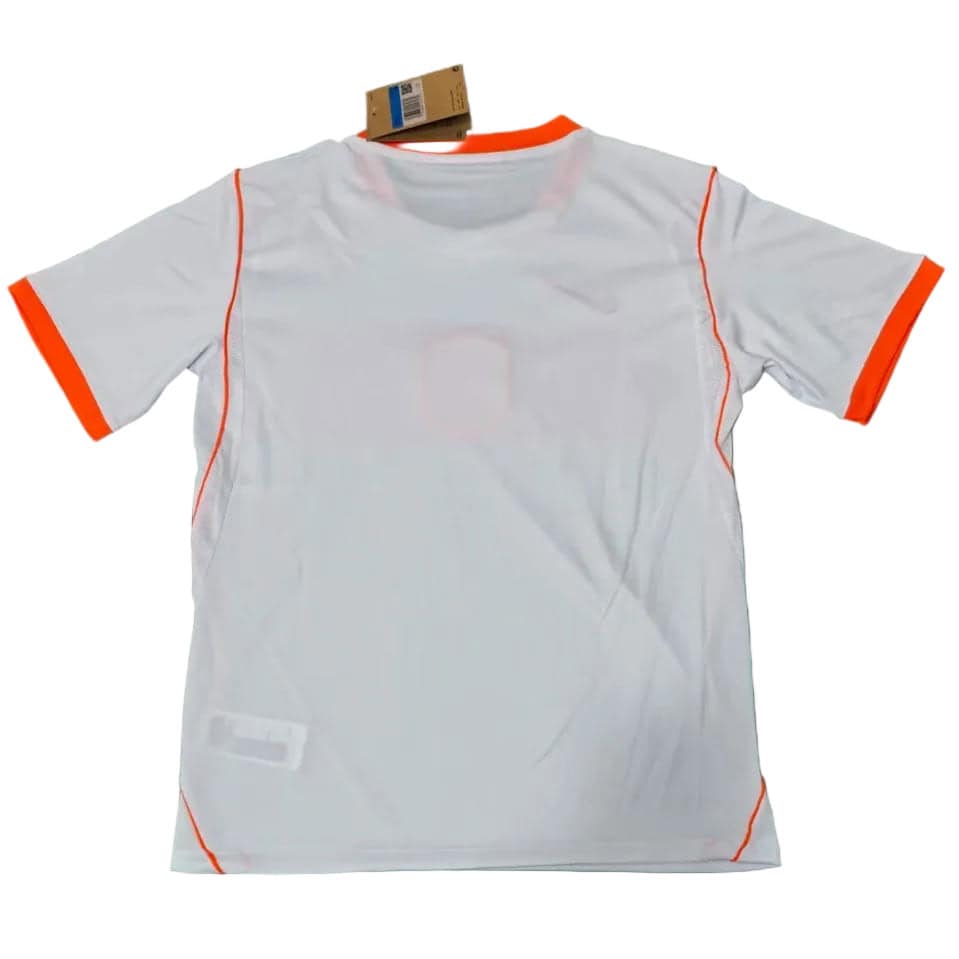 qc-netherlands-away-2026-world-cup-jersey-fan-version-from-v0-otaj1gh4e0og1 | AE JERSEY White athletic T-shirt with orange trim on cuffs and seams, tag attached near neckline.