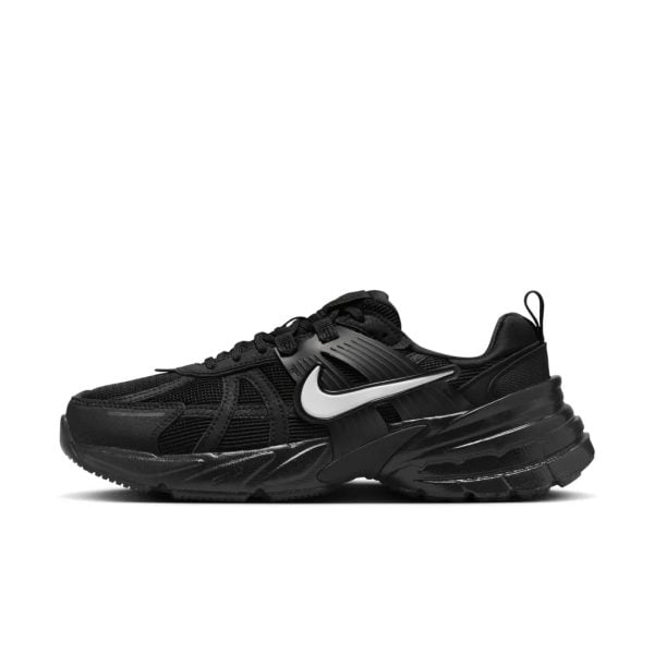 Black Nike running shoe with a chunky sole and white swoosh viewed from the side