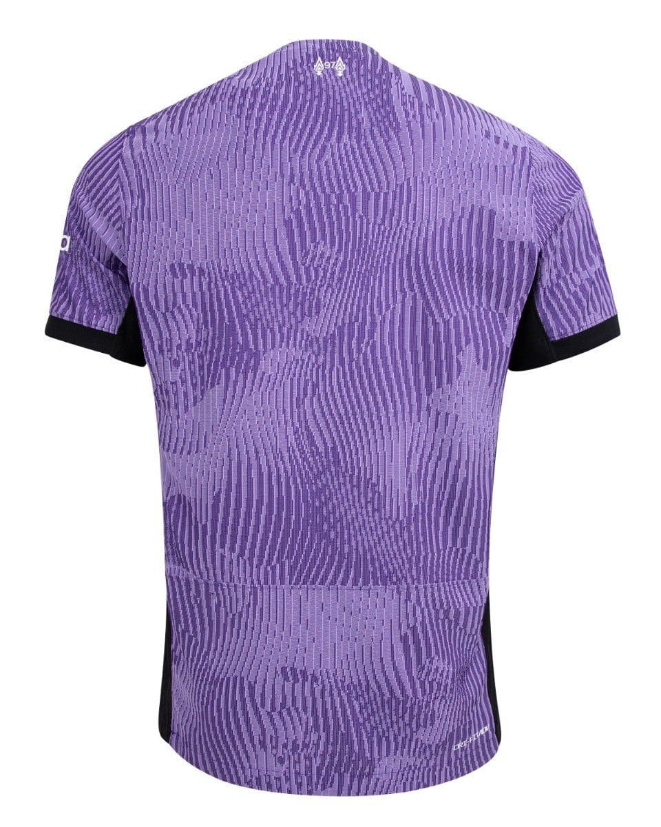 rn-image_picker_lib_temp_97184531-9639-4b0b-b36d-2952b38303cb | AE JERSEY Back view of a purple camouflage-pattern cycling jersey with black sleeve cuffs and subtle vertical texture