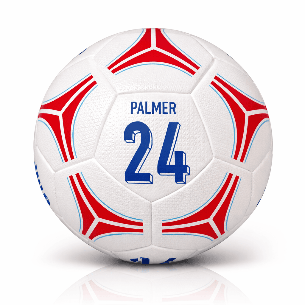 rn-image_picker_lib_temp_b7c65b18-2a5e-4a5a-bfe6-c9947a0fbe64 | AE JERSEY White soccer ball with red and blue geometric patterns, featuring the name Palmer and the number 24 printed on it.