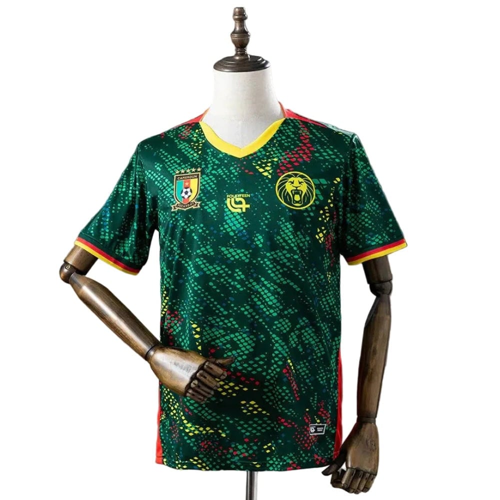 s-l1600_1_1bb479e0-a584-4402-950f-b0a0ff43bf27 | AE JERSEY Cameroon national team football jersey on a mannequin, green with yellow trim and team logos on the chest.
