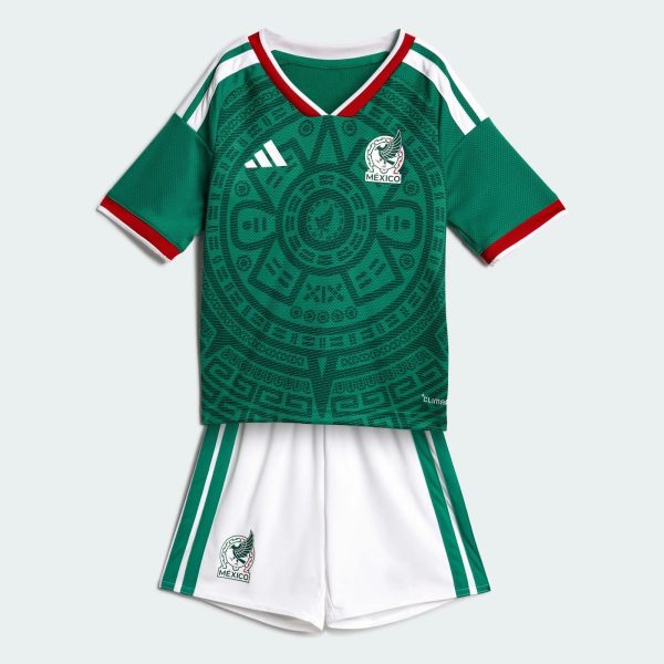 Mexico national team green jersey with white shorts, featuring crest and Adidas logo and decorative circular pattern