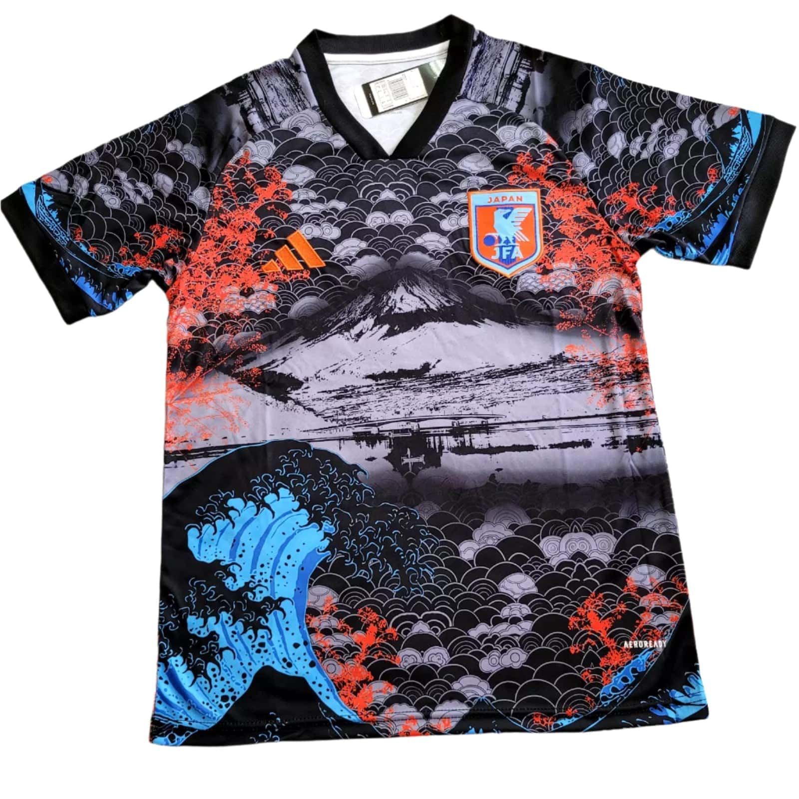 s-l1600_5_2cf190b0-a299-4833-9a8a-7c95a4150f28 | AE JERSEY Japan national football team jersey featuring a bold wave pattern in black, gray, blue and orange with the JFA crest on the chest