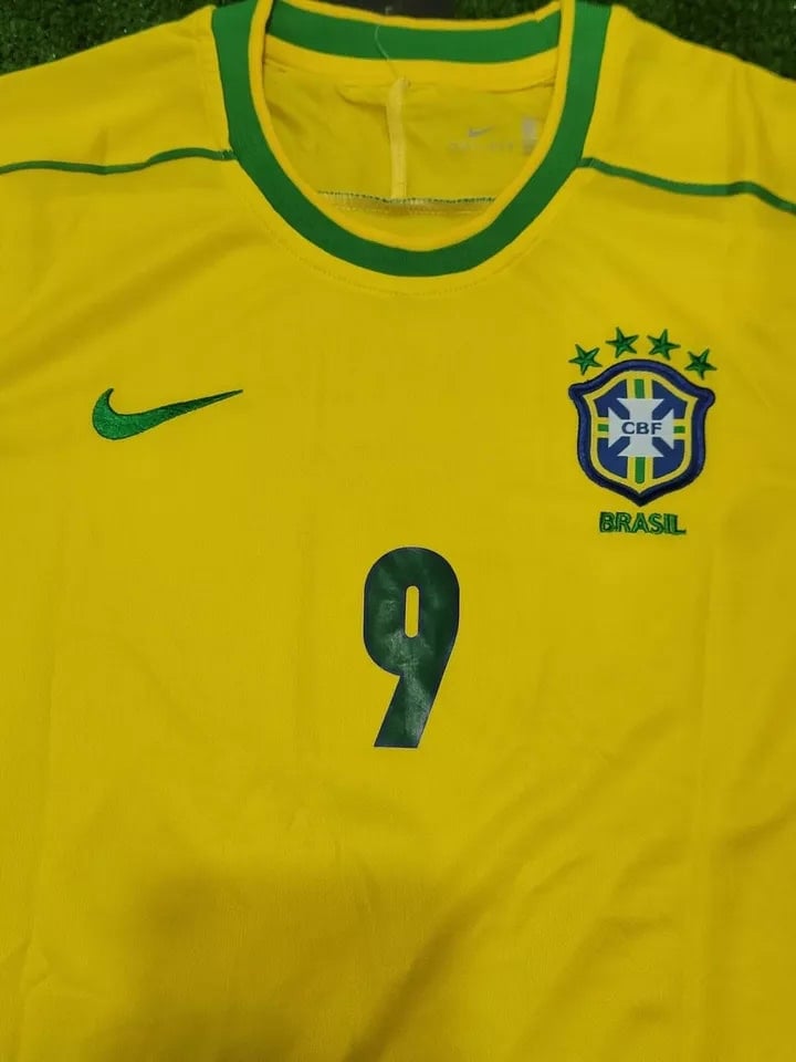 s-l960_12 | AE JERSEY Yellow Brazil national football jersey with green trim, Nike swoosh, CBF crest with five stars, and number 9.