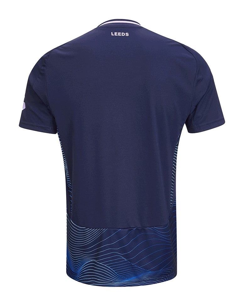 yL80LnEchAKe0ow | AE JERSEY Back view of a navy blue sports jersey with the word 'LEEDS' near the neck and light blue wave pattern along the hem area.